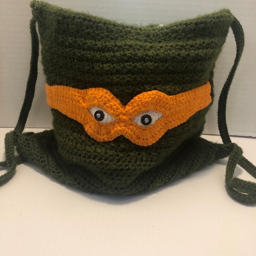 Ninja Turtles Green Crochet Backpack with Orange Mask Design